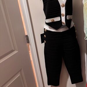 Black Capri pants, matching halter top also available